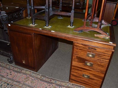 Lot 545 - A mahogany twin pedestal writing desk