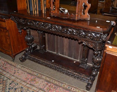 Lot 547 - A carved mahogany hall table with single drawer