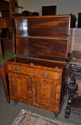 Lot 549 - Small Regency mahogany chiffonier, with open shelves and two keys