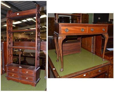 Lot 550 - A reproduction mahogany two drawer side table and a reproduction mahogany open bookcase