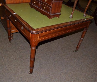 Lot 551 - Mahogany two drawer writing table