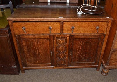 Lot 553 - 1930's oak cupboard and a barley twist standard lamp