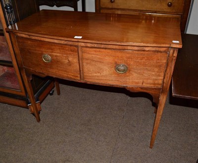 Lot 570 - A small mahogany two drawer sideboard