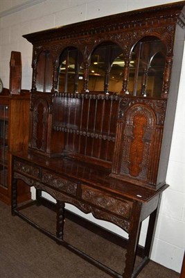 Lot 578 - An 18th century oak dresser and rack