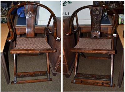 Lot 581 - A pair of Chinese horseshoe folding chairs