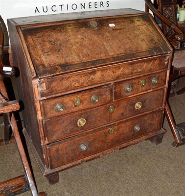 Lot 582 - A Georgian walnut bureau