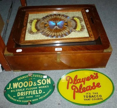 Lot 672 - A mahogany display case, inlaid tray, two advertising signs