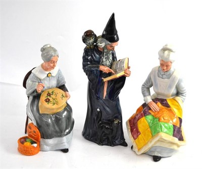 Lot 23 - Three Doulton figures - 'Eventide', 'The Wizard' and 'Embroidering'