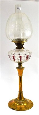 Lot 45 - An Edwardian oil lamp with etched glass shade