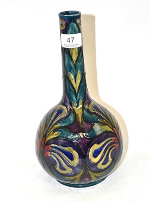 Lot 47 - A Morrisware bottle vase produced by S.Hancock & Sons, decorated with stylised floral motifs