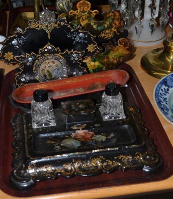 Lot 53 - A Victorian inlaid and painted papier mache standish, two pin trays and two racks