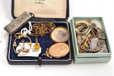 Lot 62 - An early 20th century stone set pendant, lockets, a bar brooch, a silver ingot etc