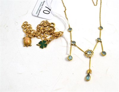 Lot 70 - A fancy link bracelet hung with two charms and a gem set fringe necklace