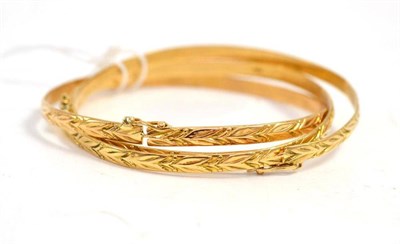 Lot 73 - Three patterned bangles