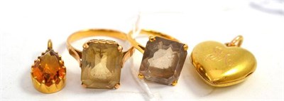 Lot 75 - Two quartz set rings, a citrine pendant and a heart shaped locket stamped '15ct'