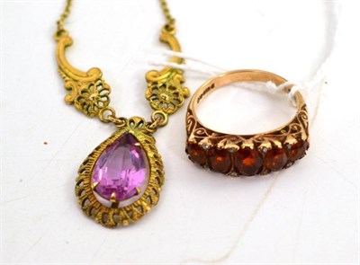 Lot 81 - Necklace with pink stone and a citrine and diamond ring