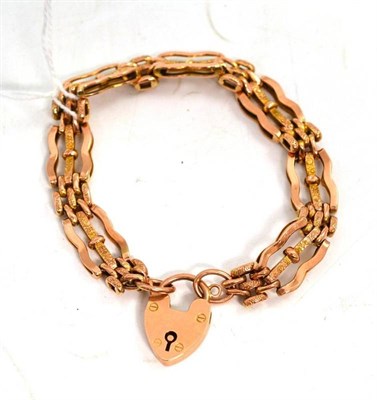 Lot 85 - A 9ct rose gold gate bracelet