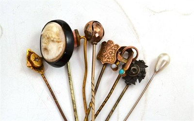 Lot 114 - Eight assorted stick pins including one set with a cameo and jet frame