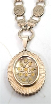 Lot 121 - A floral decorated locket hallmarked Birmingham 1898 on a Victorian fancy necklace