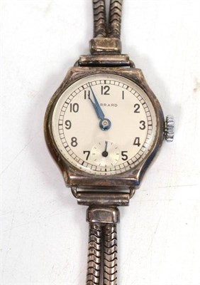 Lot 127 - A lady's silver wristwatch, by Garrard