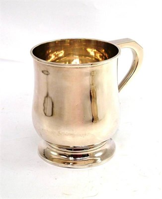 Lot 135 - A silver mug in the George III style, London 1930, Hamilton & Co