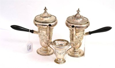 Lot 156 - A pair of silver cafe au lait pots and cream pot