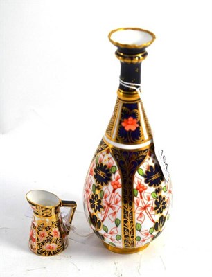 Lot 164 - A Royal Crown Derby Imari pattern vase and a miniature ewer (2)