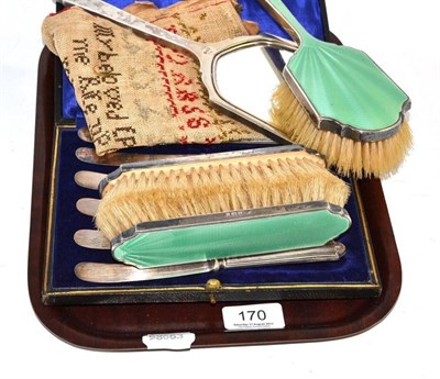 Lot 170 - Four piece silver and enamel dressing table set, sampler, cased set of six silver handled tea...