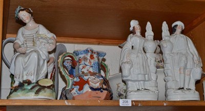 Lot 208 - Two Masons ironstone jugs, four Staffordshire figures, Staffordshire house, toilet jug and...