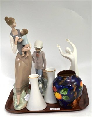 Lot 232 - A Lladro china figure, Nao figure, Doulton figure - 'Awakening', a Tunstall vase and a pair of...