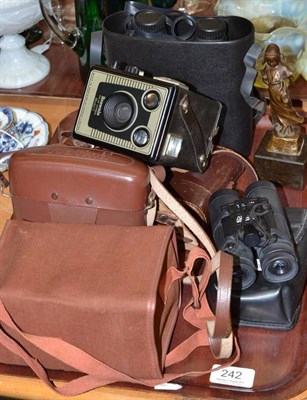 Lot 242 - Austrian bronze figure of a girl, three cameras and two binoculars