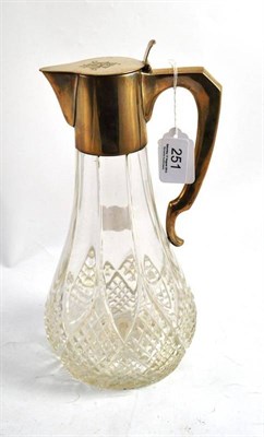 Lot 251 - A Continental white metal mounted claret jug, 800 standard