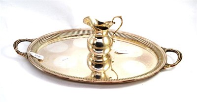 Lot 258 - A Peruvian sterling jug and an oval plated tray