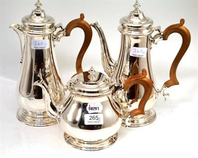 Lot 265 - Three piece silver coffee and tea service comprising teapot, coffee pot and hot water jug