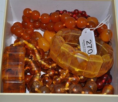 Lot 270 - An amber necklace and other amber type necklaces and bracelets