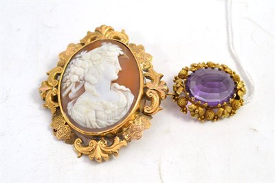 Lot 282 - A cameo brooch and an amethyst brooch