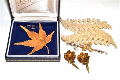 Lot 283 - Two seed pearl leaf brooches on mother-of-pearl frames, two citrine set drops, a fish and...