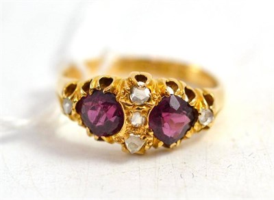 Lot 288 - A Victorian boat shaped cluster ring set with rose cut diamonds and garnets, hallmarked...