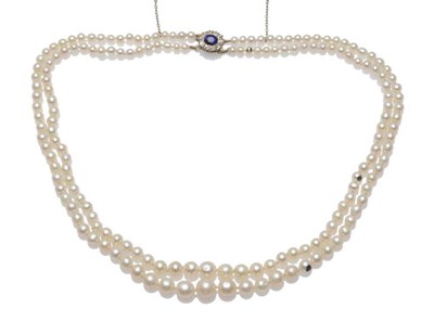 Lot 374 - An Early 20th Century Pearl Two Row Necklace, the graduated rows of 84:87 pearls knotted to an oval