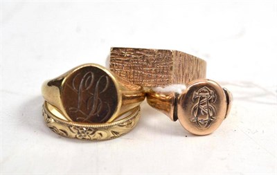 Lot 298 - Two 9ct gold signet rings, a 9ct gold band ring and another 9ct gold ring