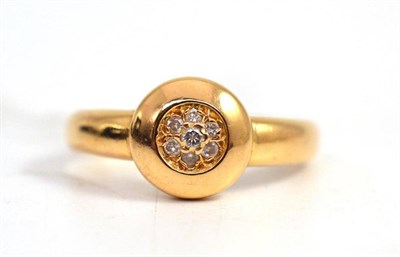 Lot 302 - An 18ct gold ring with diamond cluster centrally set