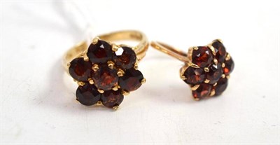 Lot 304 - Two 9ct gold garnet cluster rings