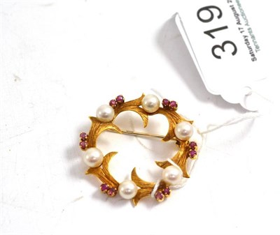 Lot 319 - An 18ct gold ruby and cultured pearl hoop brooch