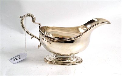 Lot 324 - A Brittania silver sauce boat