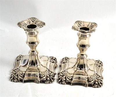 Lot 326 - A pair of Victorian silver squat candlesticks