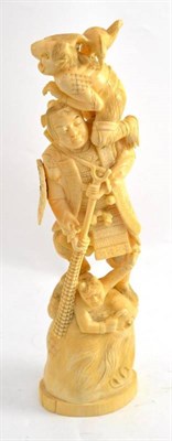 Lot 327 - A Japanese ivory okimono