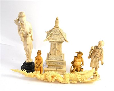 Lot 332 - Four Japanese okimono figures, dragon and bone temple (6)