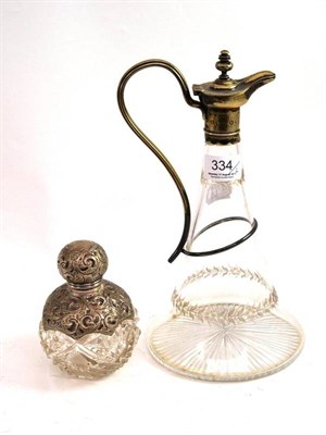 Lot 334 - Silver mounted scent bottle and a claret jug