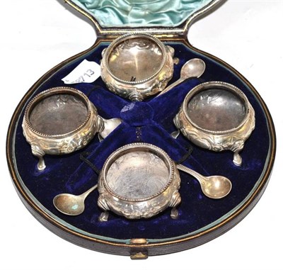 Lot 346 - Set of four silver salts and three spoons, in fitted case