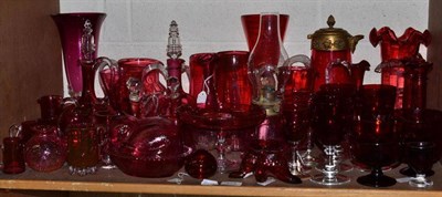 Lot 373 - Shelf of Victorian and later cranberry glass including jugs, wine glasses, etc